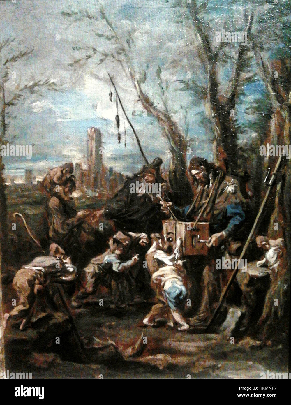 'Magnasco Magic Lantern' est une peinture de l'artiste Magnasco, représentant une scène théâtrale avec des détails complexes et un éclairage dramatique. La peinture est connue pour son utilisation de l'ombre et de la lumière, attirant l'attention sur son atmosphère mystique et surréaliste. Banque D'Images