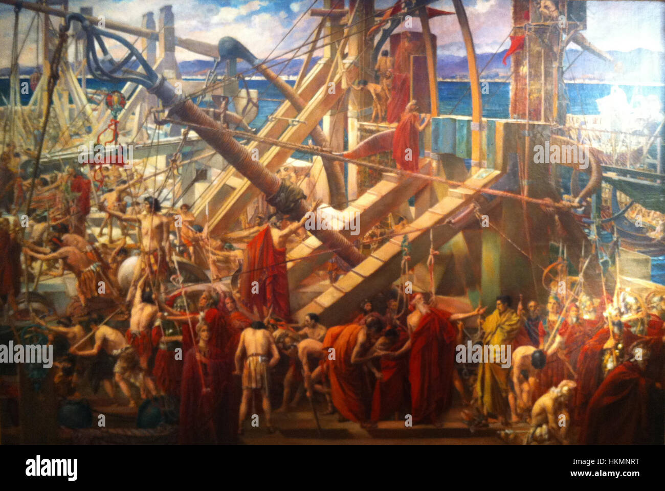 Cette œuvre représente Archimède, l'ancien mathématicien et inventeur grec, dirigeant la défense de la ville de Syracuse contre le siège romain. Il souligne sa contribution à la technologie militaire ancienne. Banque D'Images