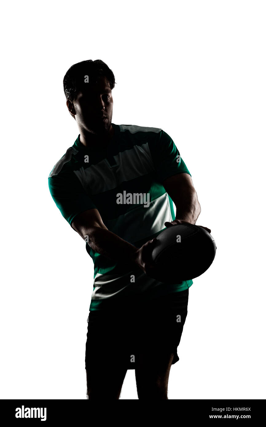 Joueur de Rugby dans un uniforme vert. Fond blanc Banque D'Images