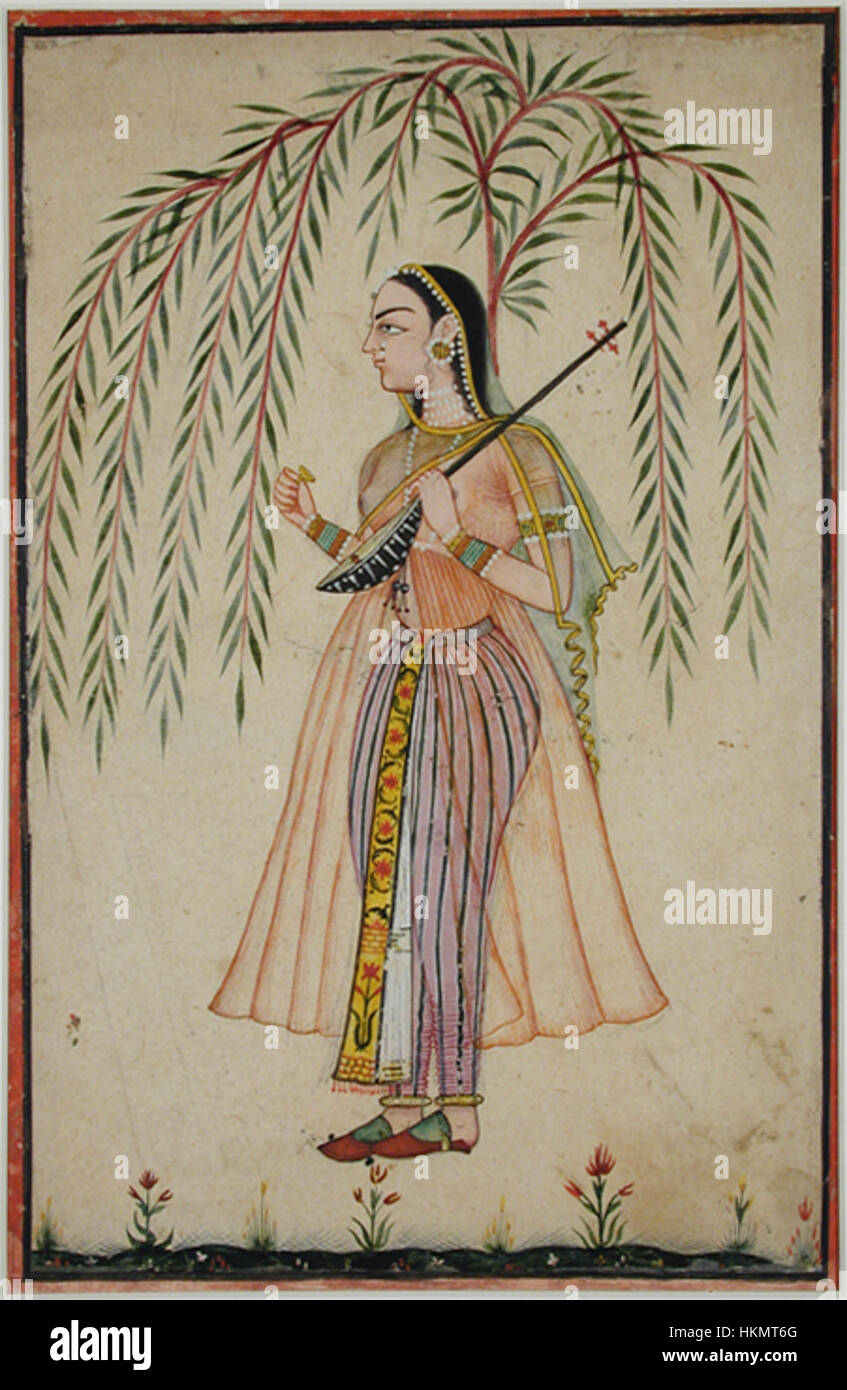 Cette œuvre représente une jeune femme tenant un tambura, un instrument traditionnel indien à cordes, debout sous un saule. La peinture met en valeur un moment serein et un lien avec la nature, avec des thèmes culturels et musicaux. Banque D'Images