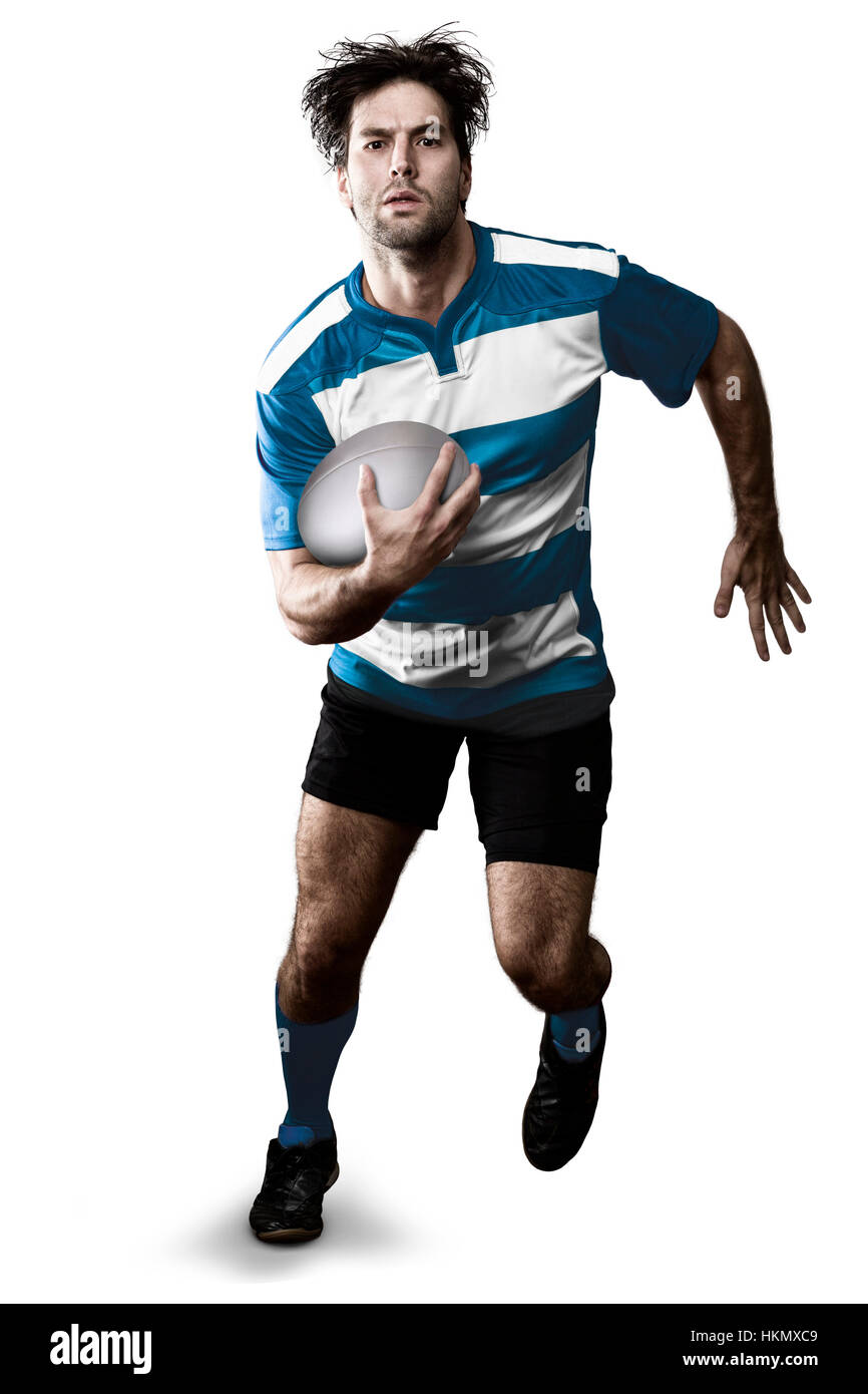 Joueur de Rugby dans un uniforme bleu d'exécution. Fond blanc Banque D'Images