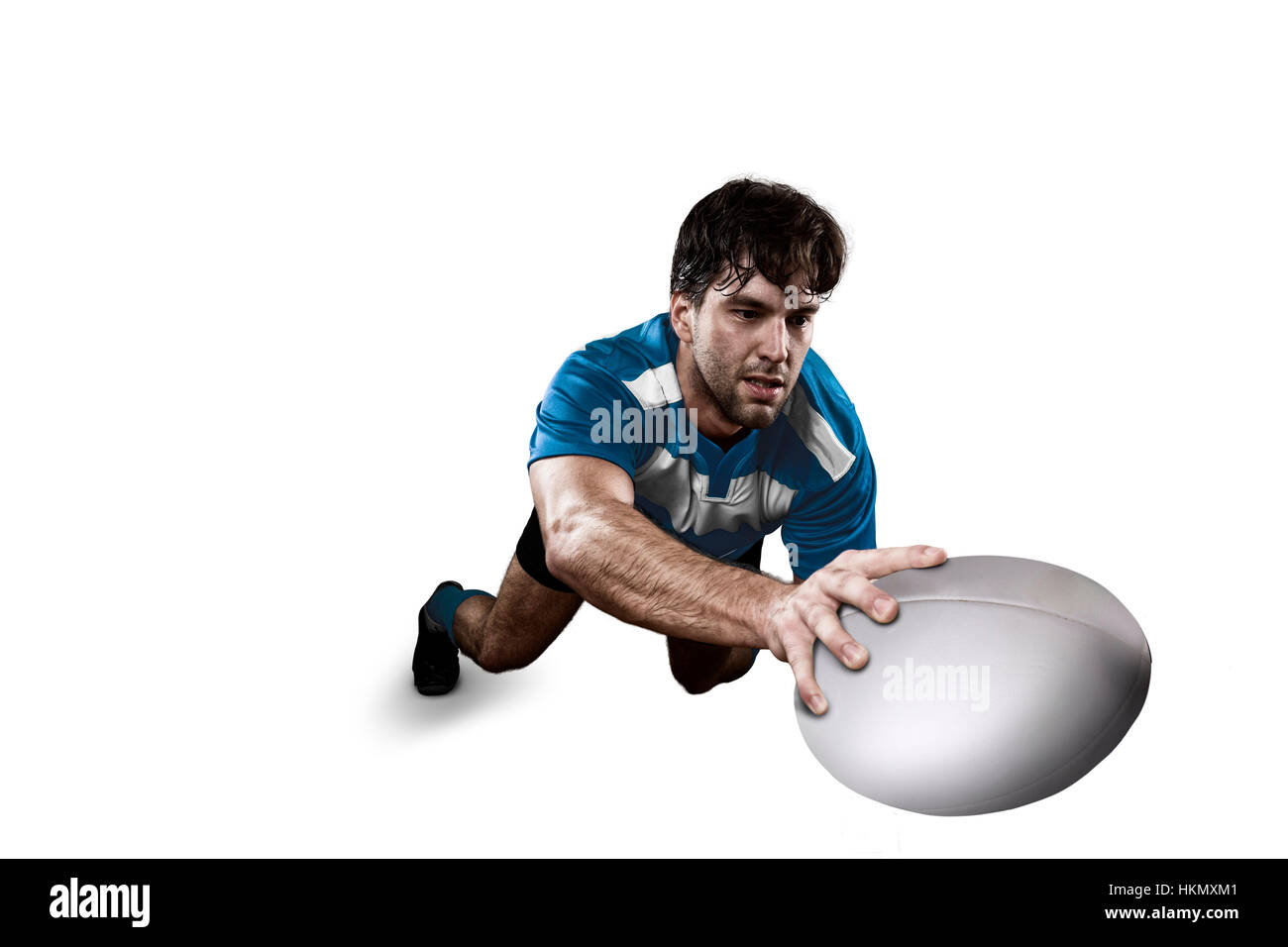Joueur de Rugby dans un uniforme bleu. Fond blanc Banque D'Images
