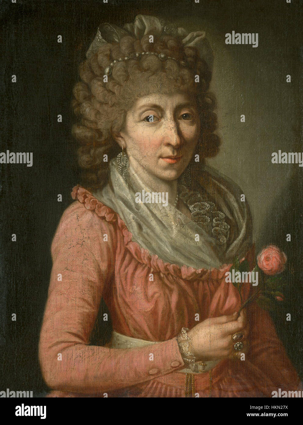 Ce portrait du XVIIIe siècle, attribué à A.R. de Gasc, représente une femme avec une rose, mettant en valeur l'élégance de la mode et du portrait d'époque en France à la fin des années 1700 Banque D'Images