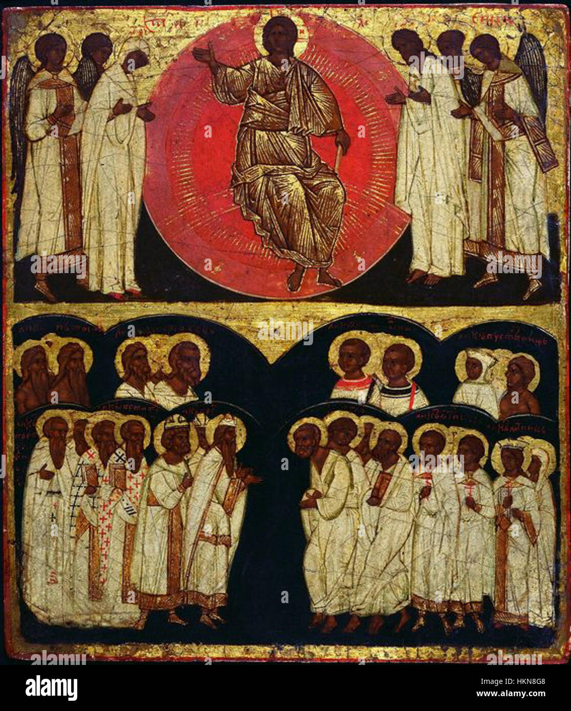 Cette icône, *Velikiy Novgorod Deesis*, représente une composition religieuse chrétienne orthodoxe orientale traditionnelle, avec des saints positionnés dans la prière autour du Christ. L'icône est une pièce importante de l'art religieux russe, représentant des figures clés de la foi. Banque D'Images