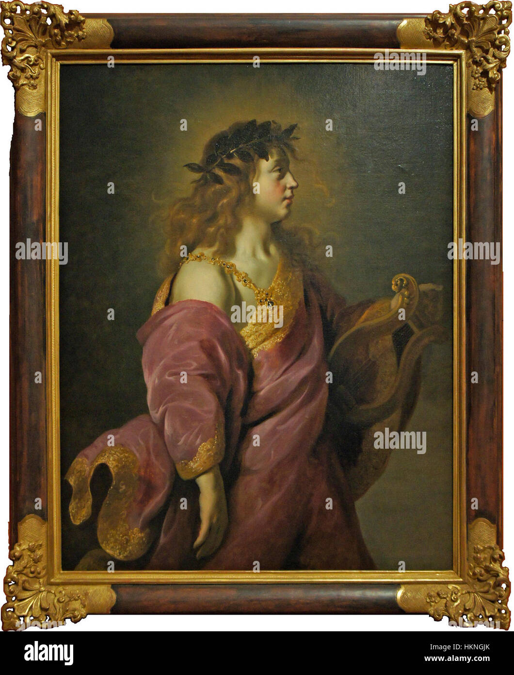 Apollon tenant sa lyre, une gravure par Adam Camerarius, présente le dieu grec Apollon tenant sa lyre, symbolisant la musique et la création artistique, reflétant la mythologie grecque classique et son influence sur l'art de la Renaissance. Banque D'Images