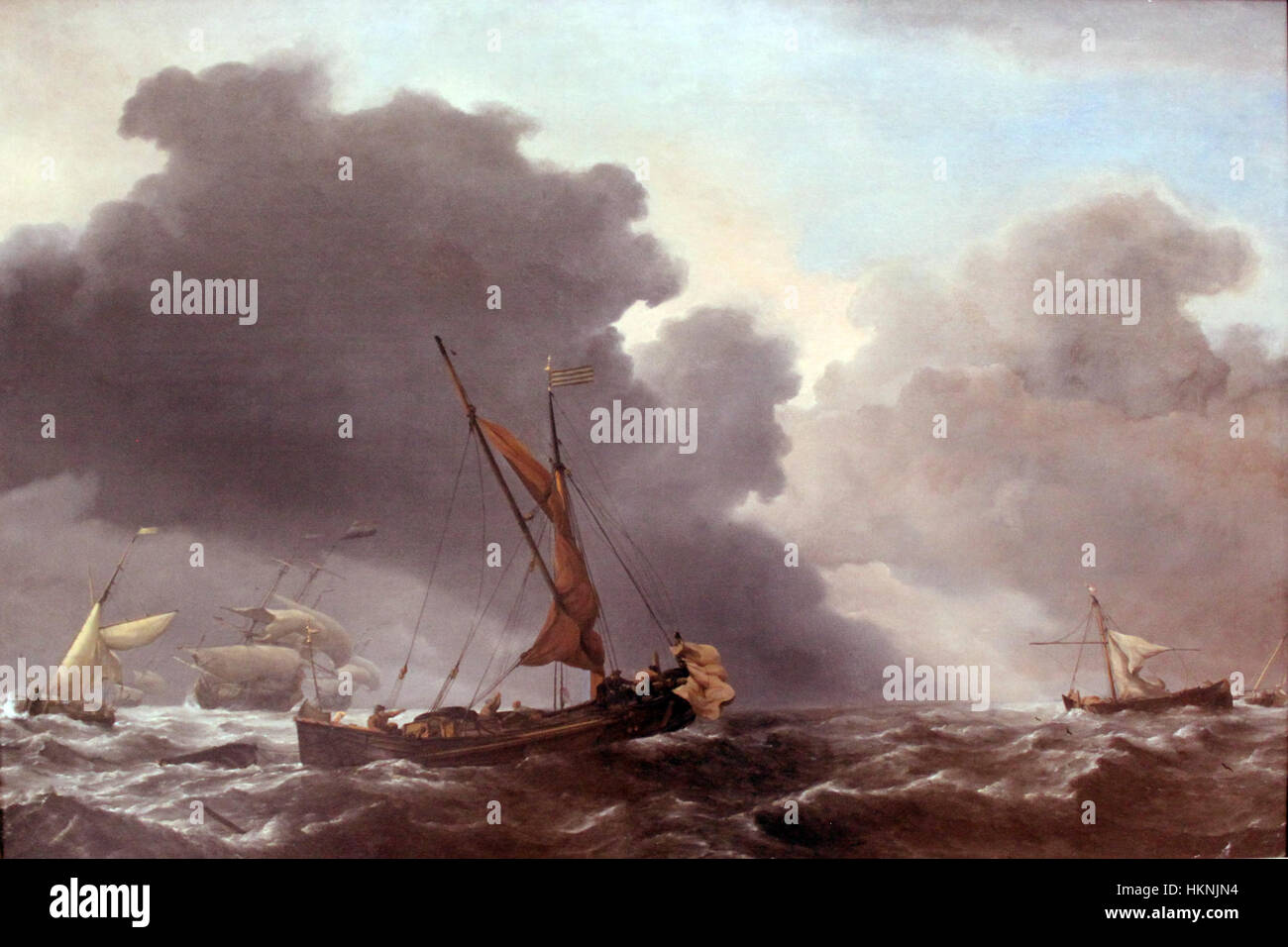 Cette peinture de 1690 de Velde représente un navire, 'Eine Karg', et d'autres voiliers naviguant dans des vents forts, mettant en valeur la vie maritime néerlandaise du XVIIe siècle et les pratiques de construction navale. Banque D'Images