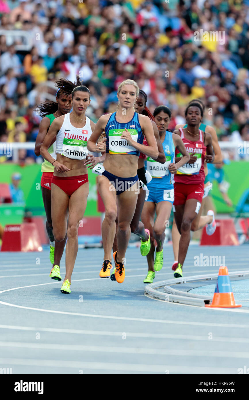 Rio de Janeiro, Brésil. 13 août 2016. L'athlétisme, Emma Coburn (USA) qui se font concurrence sur le 3000m steeple femmes chauffe à l'été 2016 Ga Banque D'Images