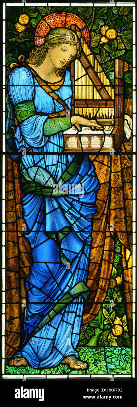 'Saint Cecilia' de Sir Edward Burne-Jones, peint vers 1900, représente le saint dans une pose sereine et dévotionnelle. Burne-Jones, figure clé du mouvement préraphaélite, présente Sainte Cécile avec une qualité éthéré, soulignant son rôle de sainte patronne de la musique et des art. La peinture reflète la maîtrise de l'artiste dans la représentation de thèmes religieux et mythiques. Banque D'Images