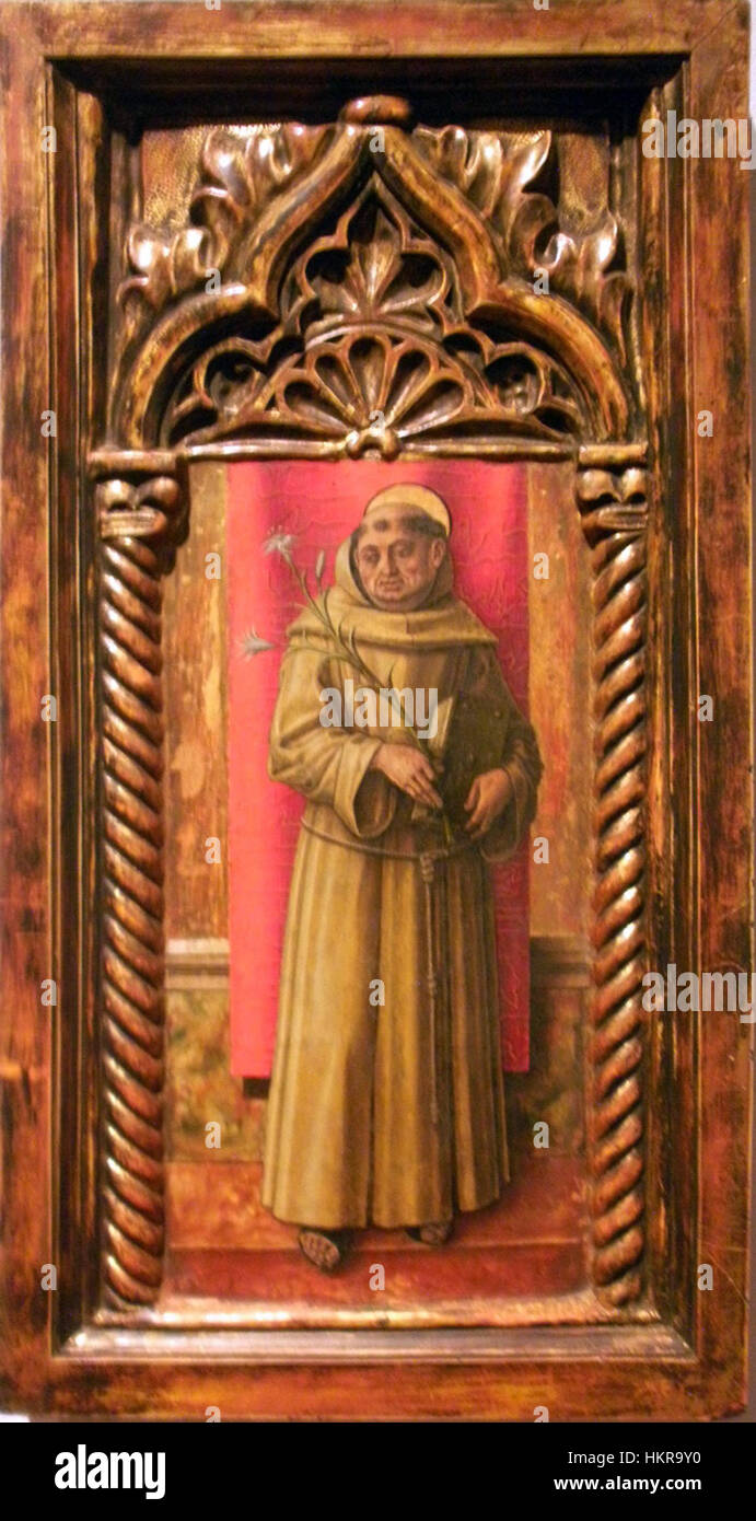 Heilige Antonius de Carlo Crivelli datant de 1485 à 90, hébergé au Bonnefantenmuseum Maastricht, représente une représentation religieuse puissante du saint, soulignant l'utilisation précise de la couleur et du symbolisme par Crivelli dans son style du début de la Renaissance. Banque D'Images