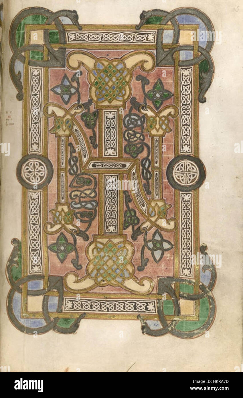 Cette page manuscrite, intitulée « Incipit John », commence l'Évangile de Jean avec une enluminure médiévale complexe et une calligraphie. L'œuvre reflète la tradition médiévale des textes religieux décorés d'illustrations vibrantes. Banque D'Images