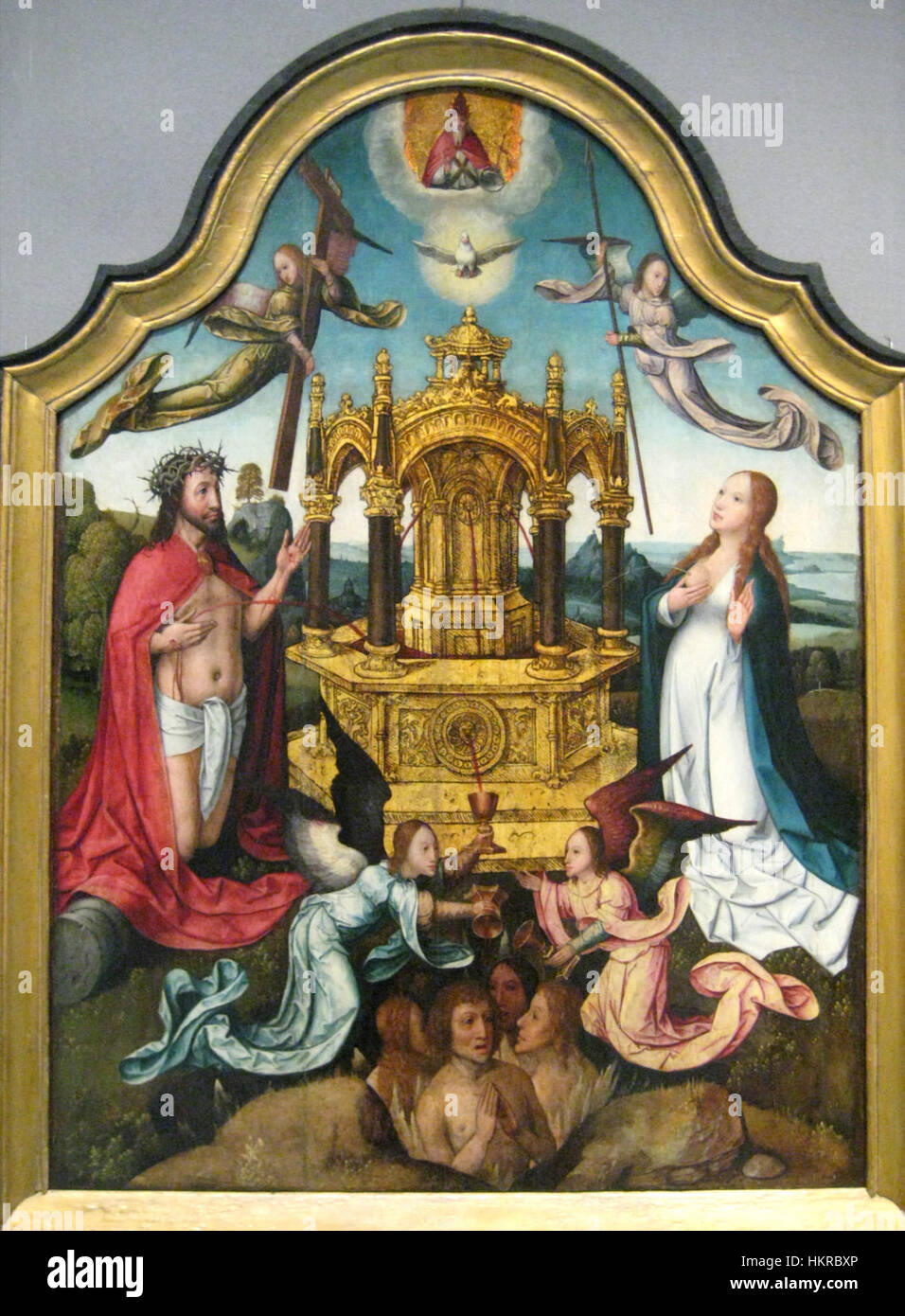 Ce triptyque, attribué à Jean Bellegambe et à son atelier, représente le sang du Christ dans une scène religieuse vivante et détaillée. La peinture met en valeur l'utilisation complexe de la couleur et du symbolisme dans l'art chrétien, reflétant la signification spirituelle et historique du récit religieux. Banque D'Images