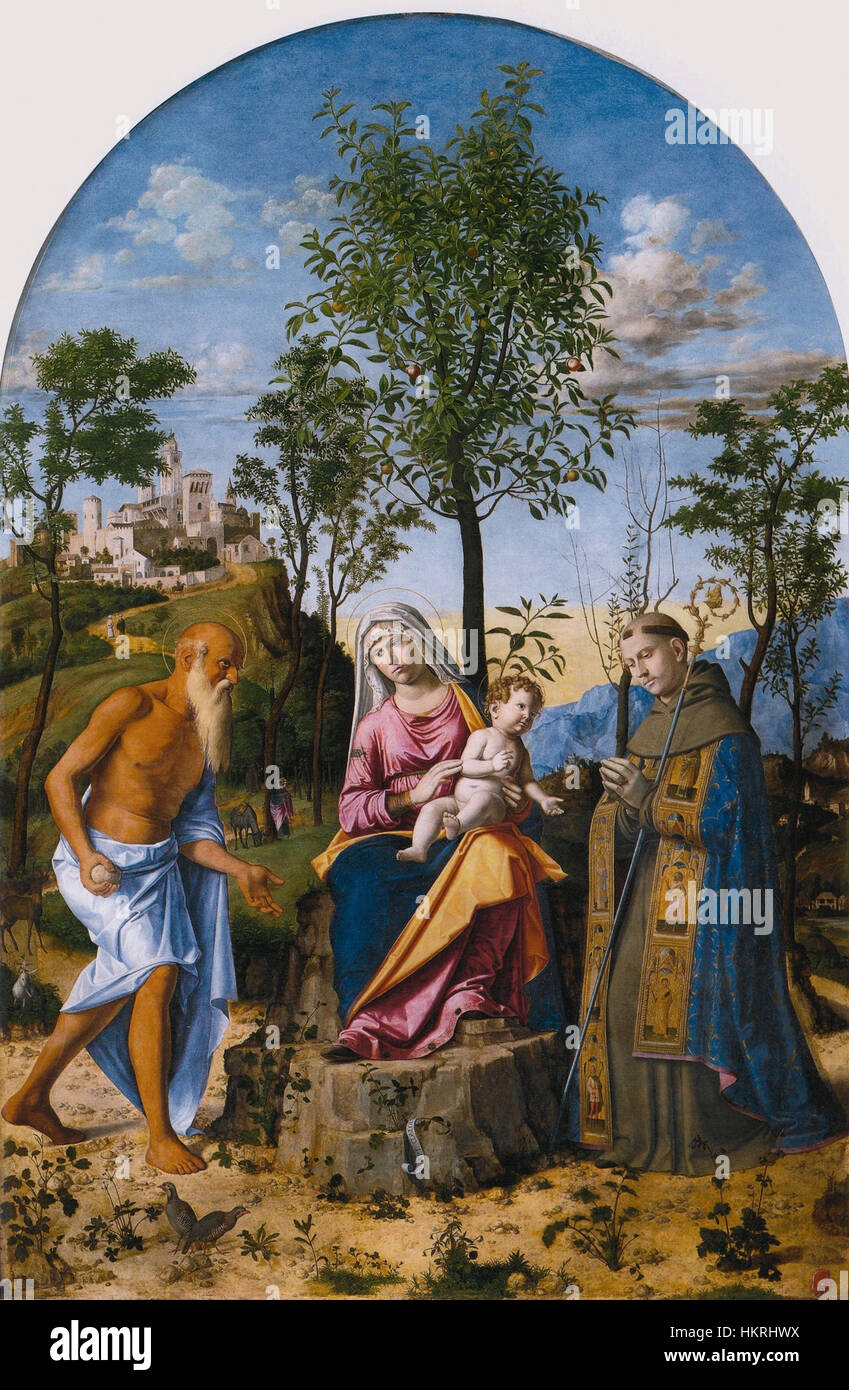 'Madonna dell'Arancio' de Cima da Conegliano est une peinture de la Renaissance représentant la Vierge Marie tenant l'enfant Jésus. L'œuvre présente un symbolisme détaillé, avec une toile de fond d'un paysage serein, soulignant l'attention de l'artiste à la couleur et à la lumière dans la transmission de thèmes spirituels. Banque D'Images
