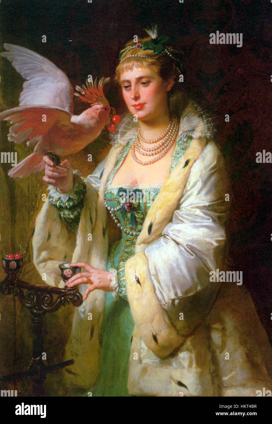 Cette peinture du XIXe siècle de Dubufe intitulée « un regal pour son animal de compagnie » dépeint une scène réfléchie avec un individu présentant un cadeau à son animal de compagnie, mettant en valeur l'habileté de l'artiste à rendre les relations homme-animal. Banque D'Images