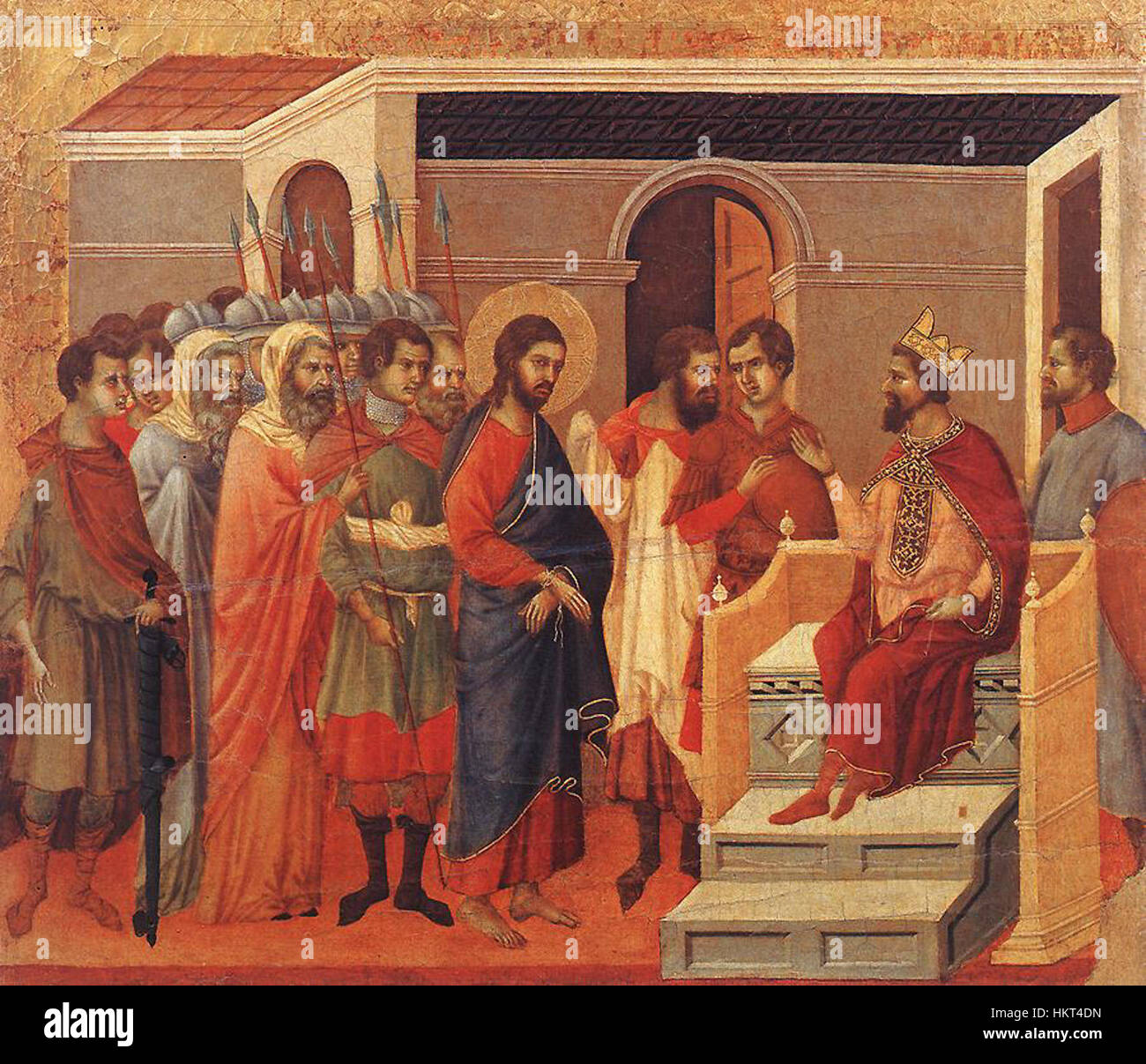 *Christ avant Hérode* est une peinture célèbre de Duccio di Buoninsegna, représentant le procès du Christ devant le roi Hérode dans le cadre du récit de la passion. L'œuvre met en valeur le style gothique de Buoninsegna, marqué par la richesse des détails et l'intensité spirituelle. Banque D'Images