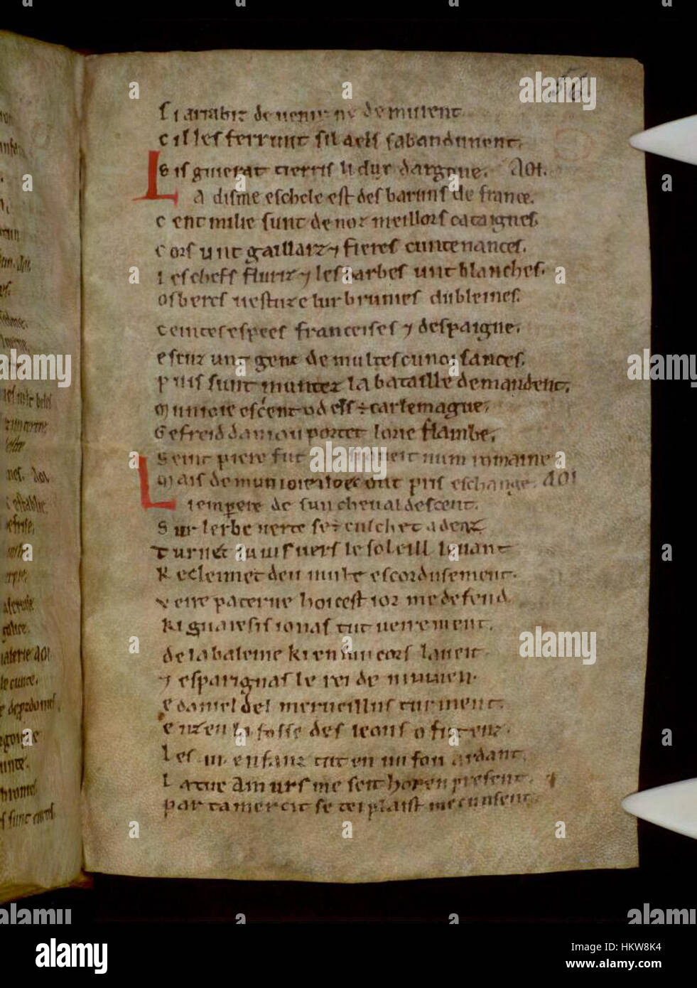 Le manuscrit la chanson de Roland, conservé dans les bibliothèques Bodléiennes, est un poème épique français enluminé du XIe siècle. Cette page présente des œuvres d’art médiévales complexes et de la calligraphie qui raconte l’histoire de l’héroïsme de Roland. Banque D'Images