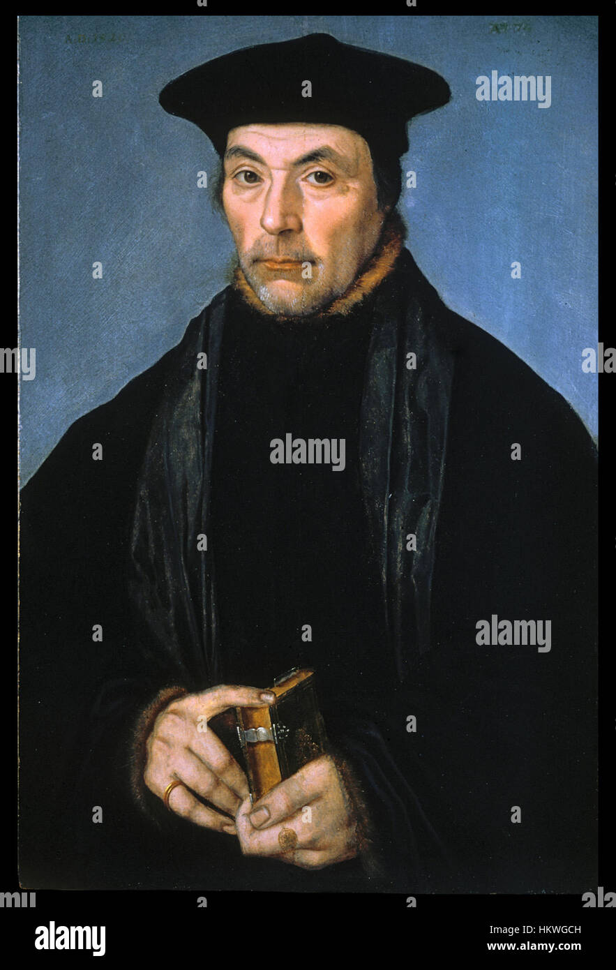 Ce portrait allemand représente un érudit ou un prédicateur de l’époque, mettant l’accent sur le rôle intellectuel ou religieux de l’individu. Le portrait détaillé met en valeur les tenues traditionnelles et la dignité du sujet. Banque D'Images