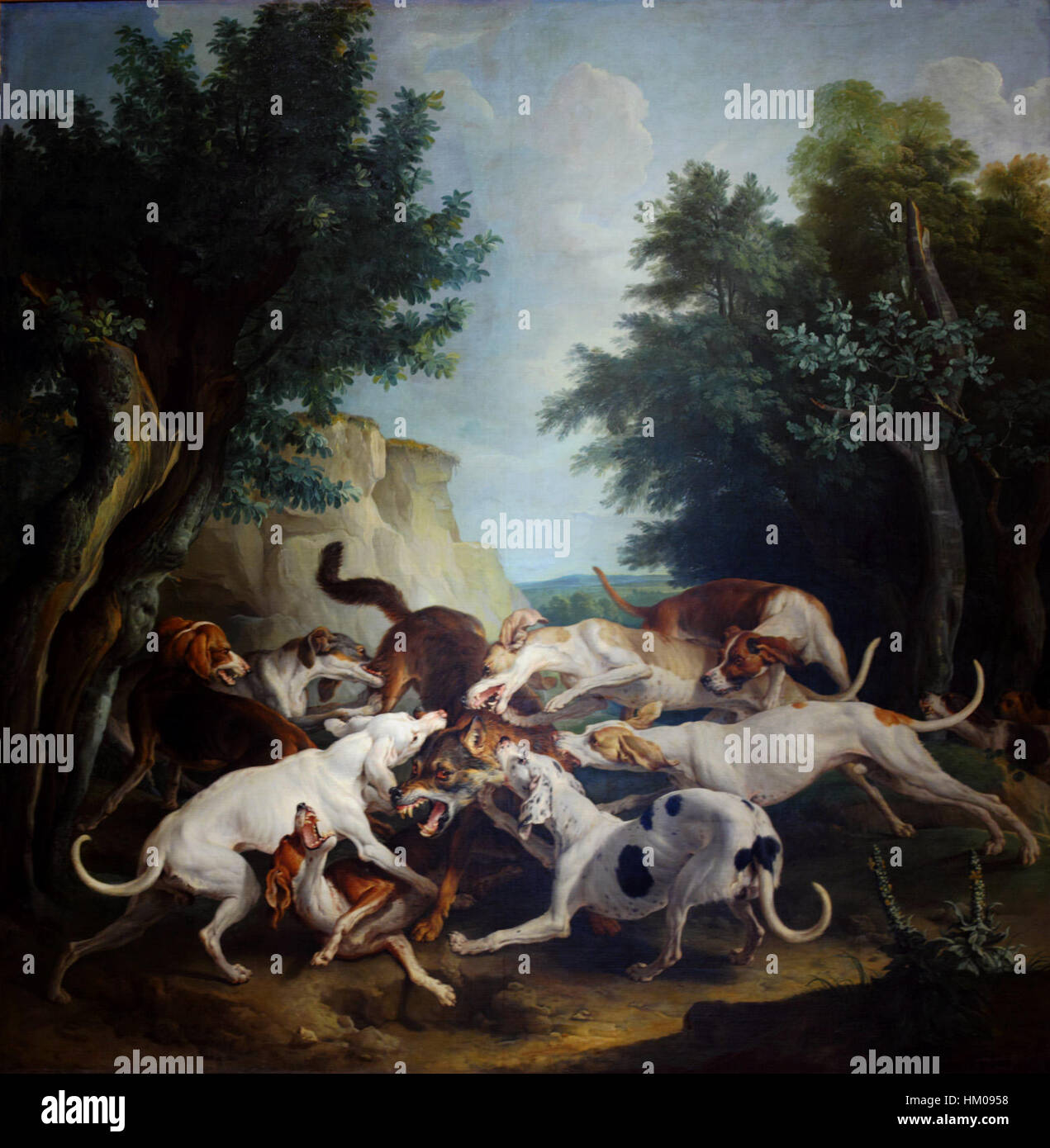 'La chasse au loup' est une peinture qui représente une scène traditionnelle de chasse au loup. L'œuvre d'art capture l'intensité et le danger de la chasse, en se concentrant sur les participants humains et animaux dans la scène. Banque D'Images