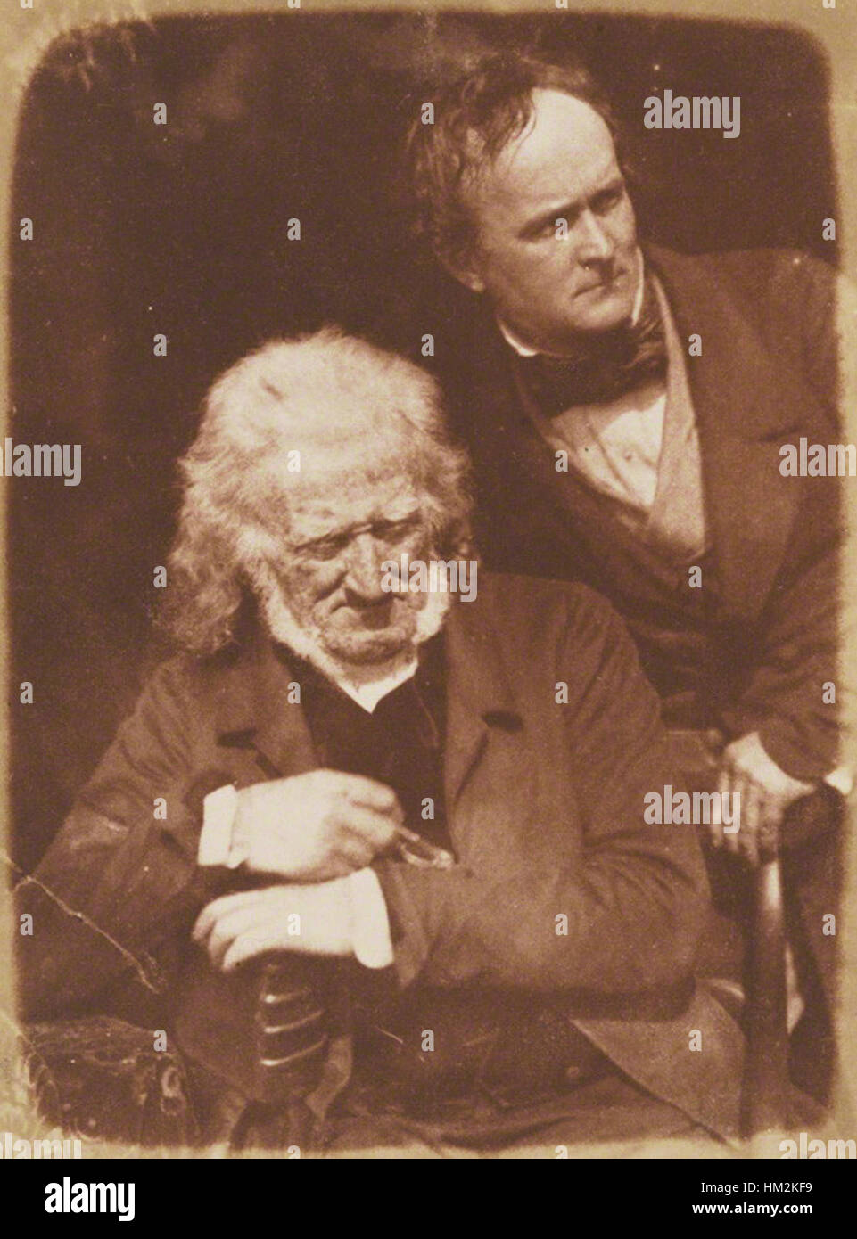 Cette peinture représente Henning et Ritchie, deux personnages capturés dans un portrait conservé à la National Portrait Gallery. La peinture met en évidence l'importance des individus dans l'histoire, illustrant leurs rôles et leurs contributions. L’œuvre est une pièce remarquable de la collection de la galerie, mettant en valeur son style et sa valeur historique. Banque D'Images