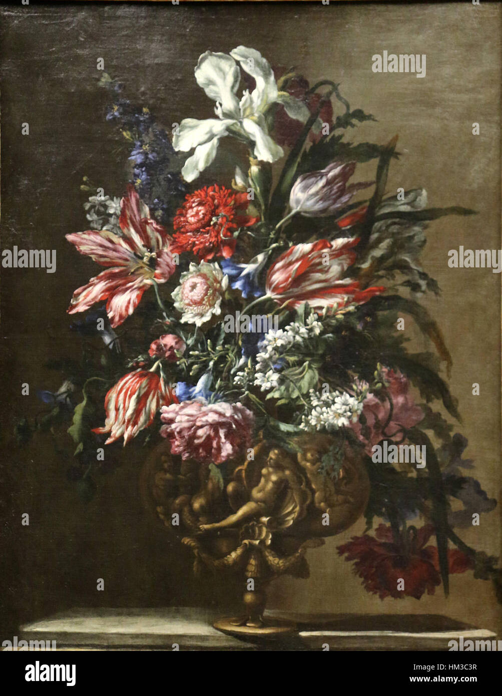 « Fleurs dans un vase 2 » de Jean-Baptiste Monnoyer est une peinture de nature morte mettant en valeur des fleurs dans un vase. L’œuvre utilise des techniques de peinture à l’huile et souligne la maîtrise de Monnoyer dans la représentation de la nature et des arrangements floraux. Banque D'Images
