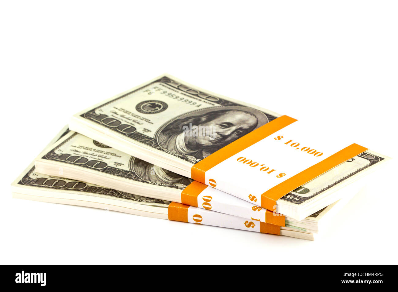 Dix mille dollars stacks sur le livre blanc Banque D'Images Dix mille dollars stacks sur le livre blanc Banque D'Images