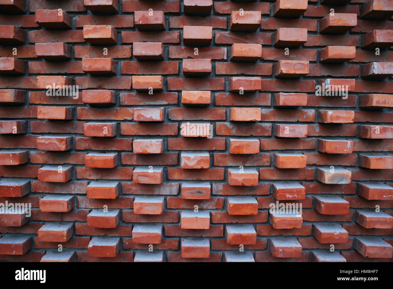 Pop up red brown brick wall texture background - architecture design Banque D'Images