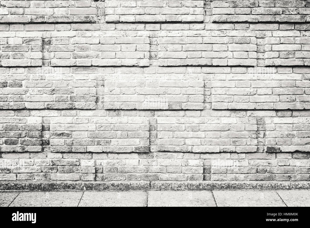 Résumé Contexte urbain vide décoratif gris avec mur de briques et de carreaux en béton Banque D'Images
