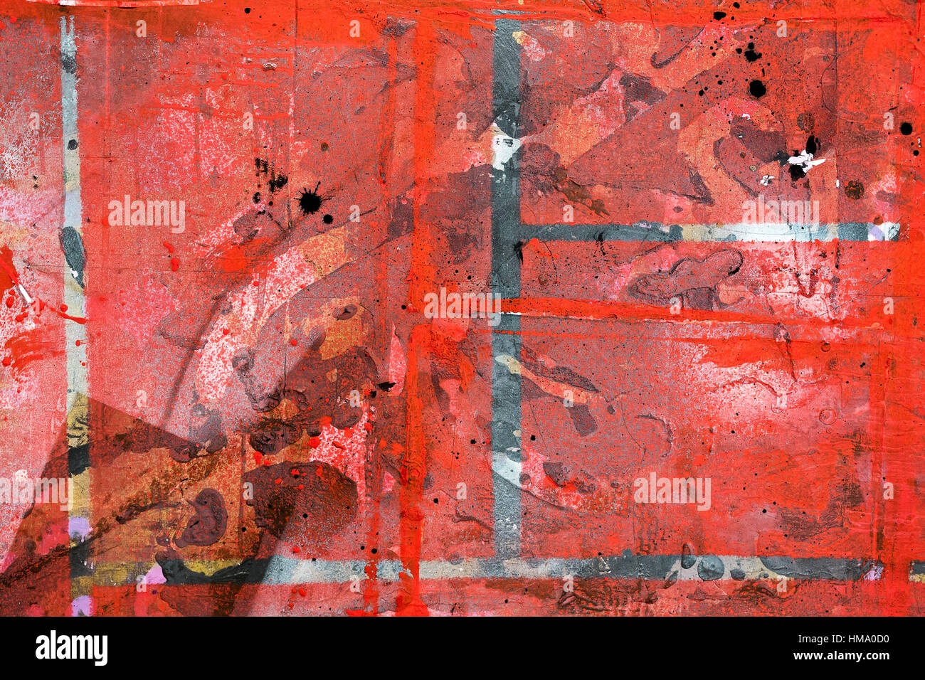 La surface tachée et peint dans des couleurs rouge Banque D'Images