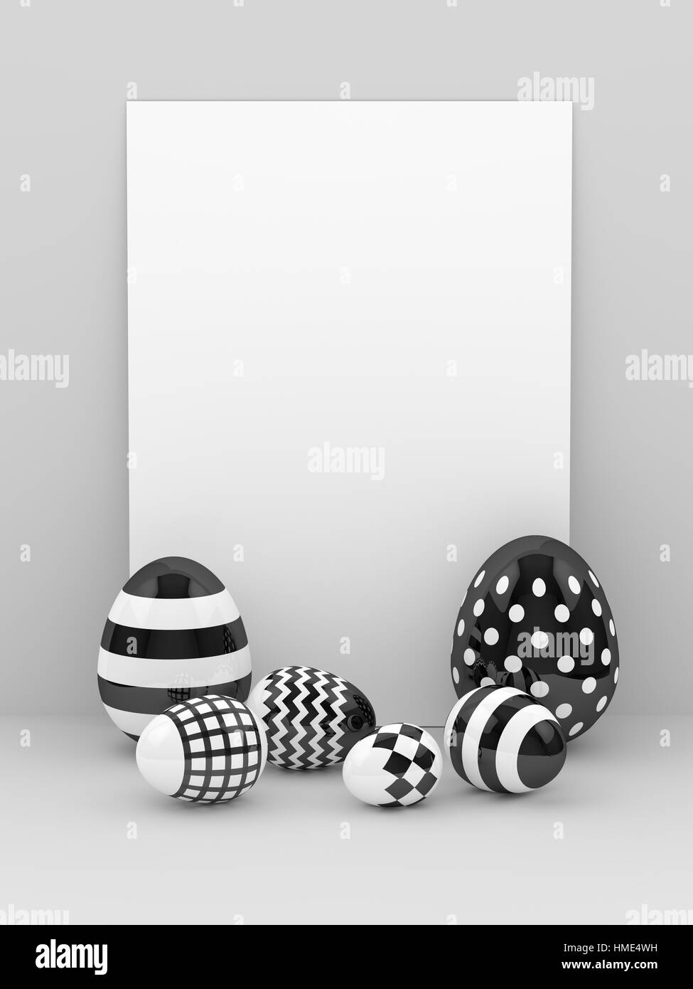 Le rendu 3d des oeufs de Pâques avec carte papier vide sur fond gris Banque D'Images