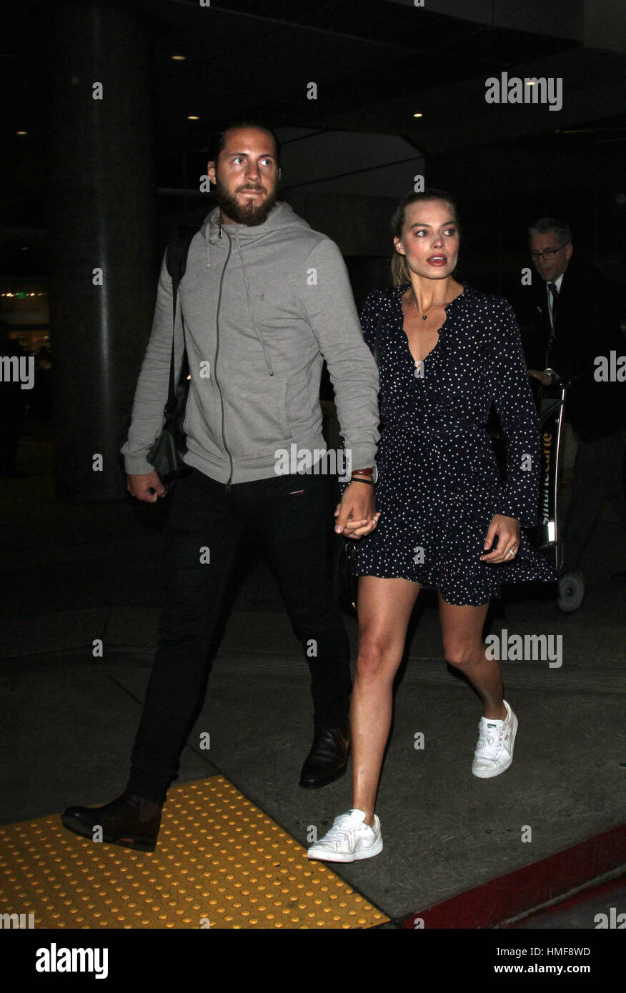 Margot Robbie Et Son Mari Margot Robbie et son mari Tom Ackerley à l'Aéroport International de Los  Angeles (LAX) comprend :