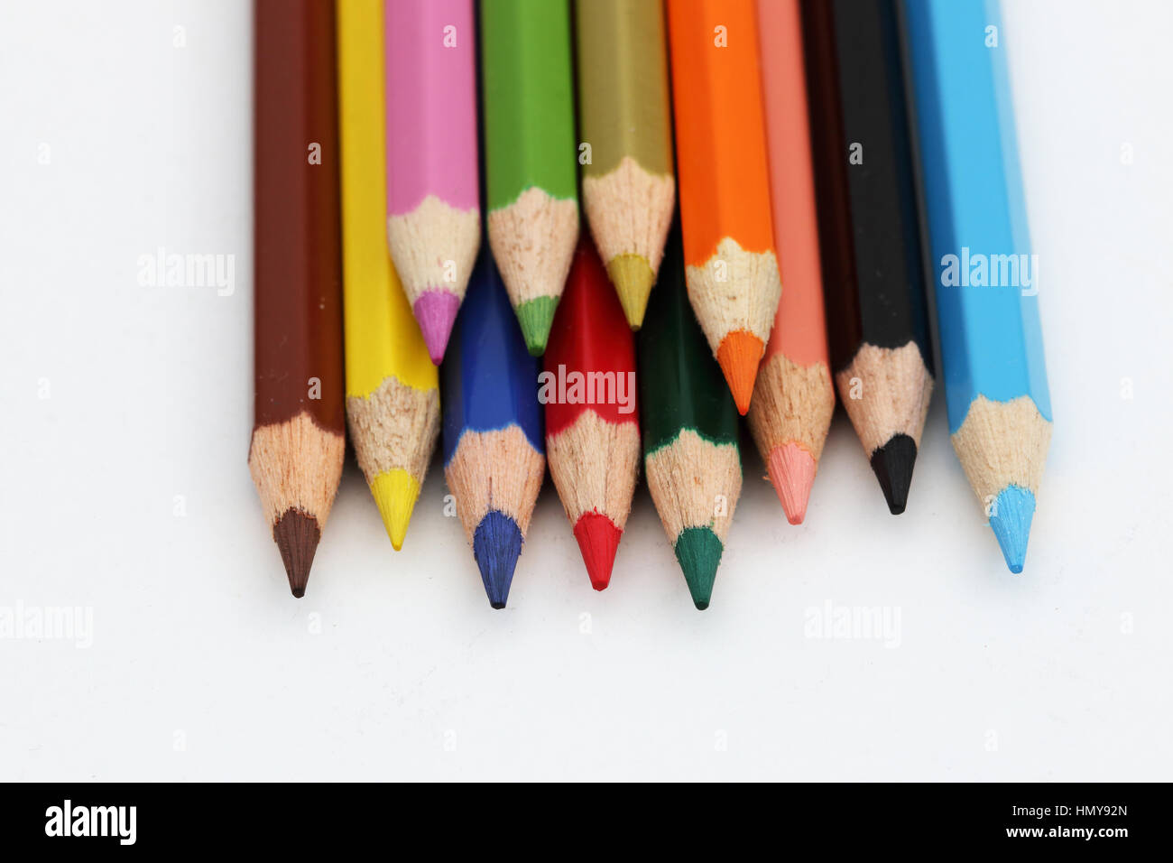 Close up of colour pencils against white background Banque D'Images