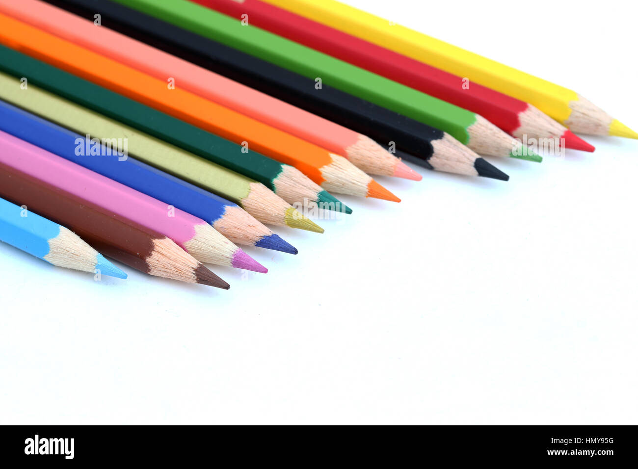 Close up of colour pencils against white background Banque D'Images