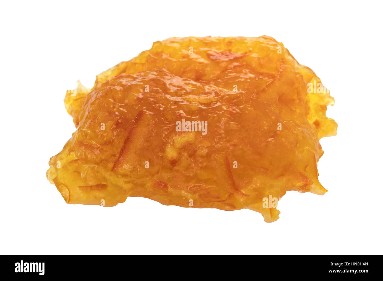 Un blob de sans-sucre la marmelade d'orange isolé sur fond blanc. Banque D'Images