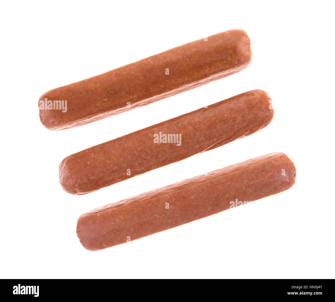 Vue du haut de trois hot dog boeuf non polymérisé isolé sur un fond blanc. Banque D'Images