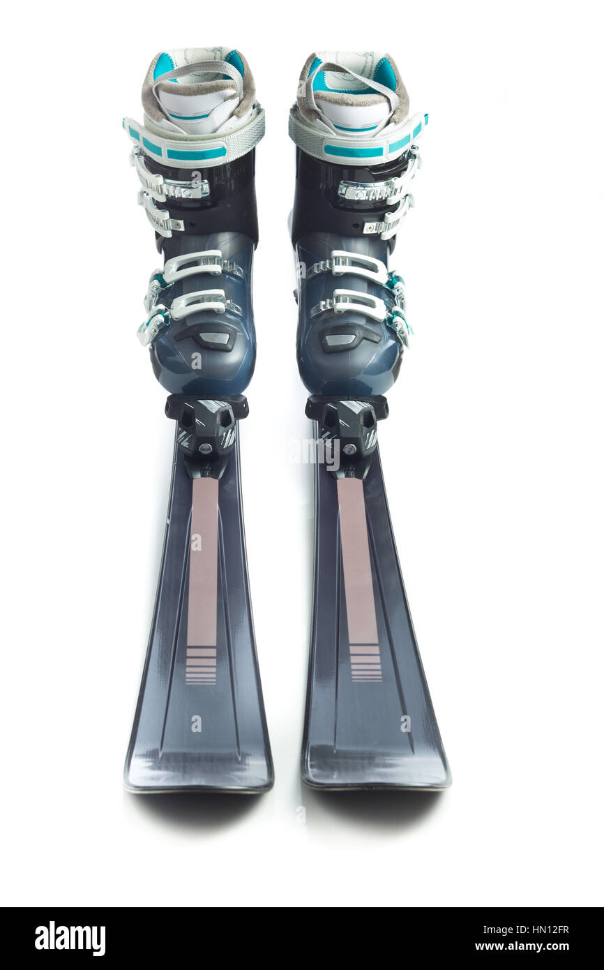 Avec Ski Chaussures de ski isolé sur fond blanc. Banque D'Images