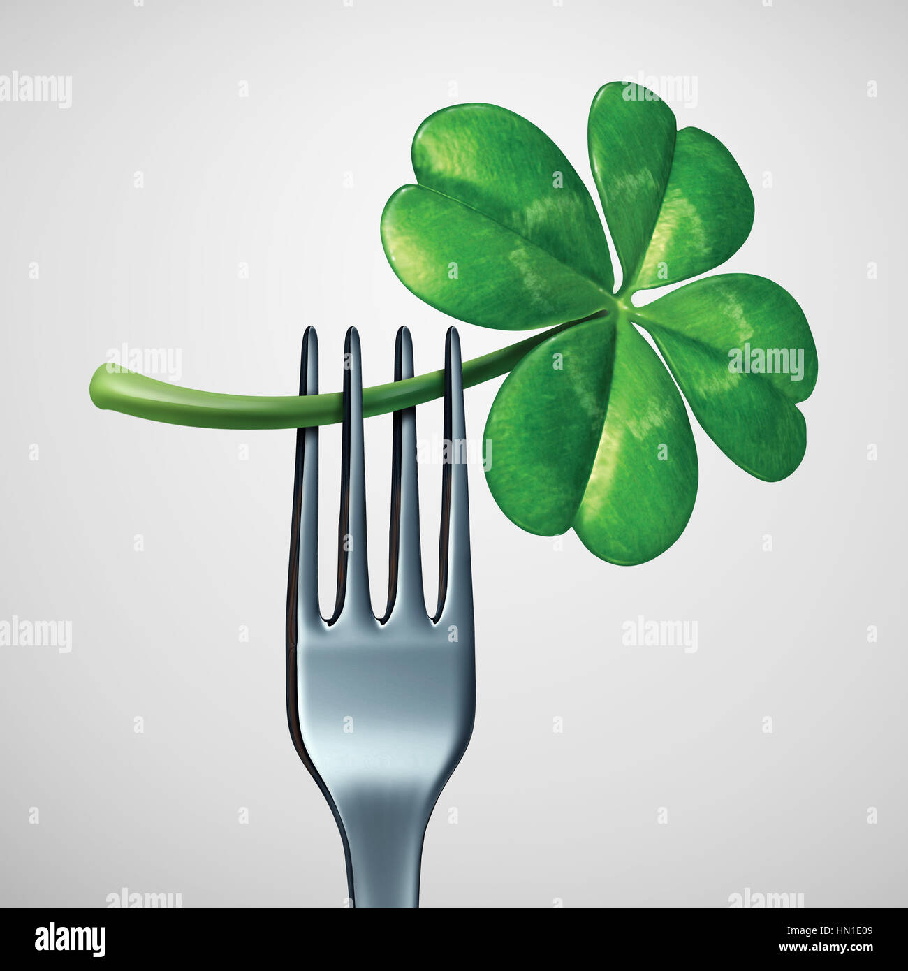 Saint Patrick day symbole alimentaire comme une fourche à l'aide d'un trèfle à quatre feuilles trèfle vert comme un traditionnel repas celtique symbole de l'héritage irlandais le dîner ou manger Banque D'Images