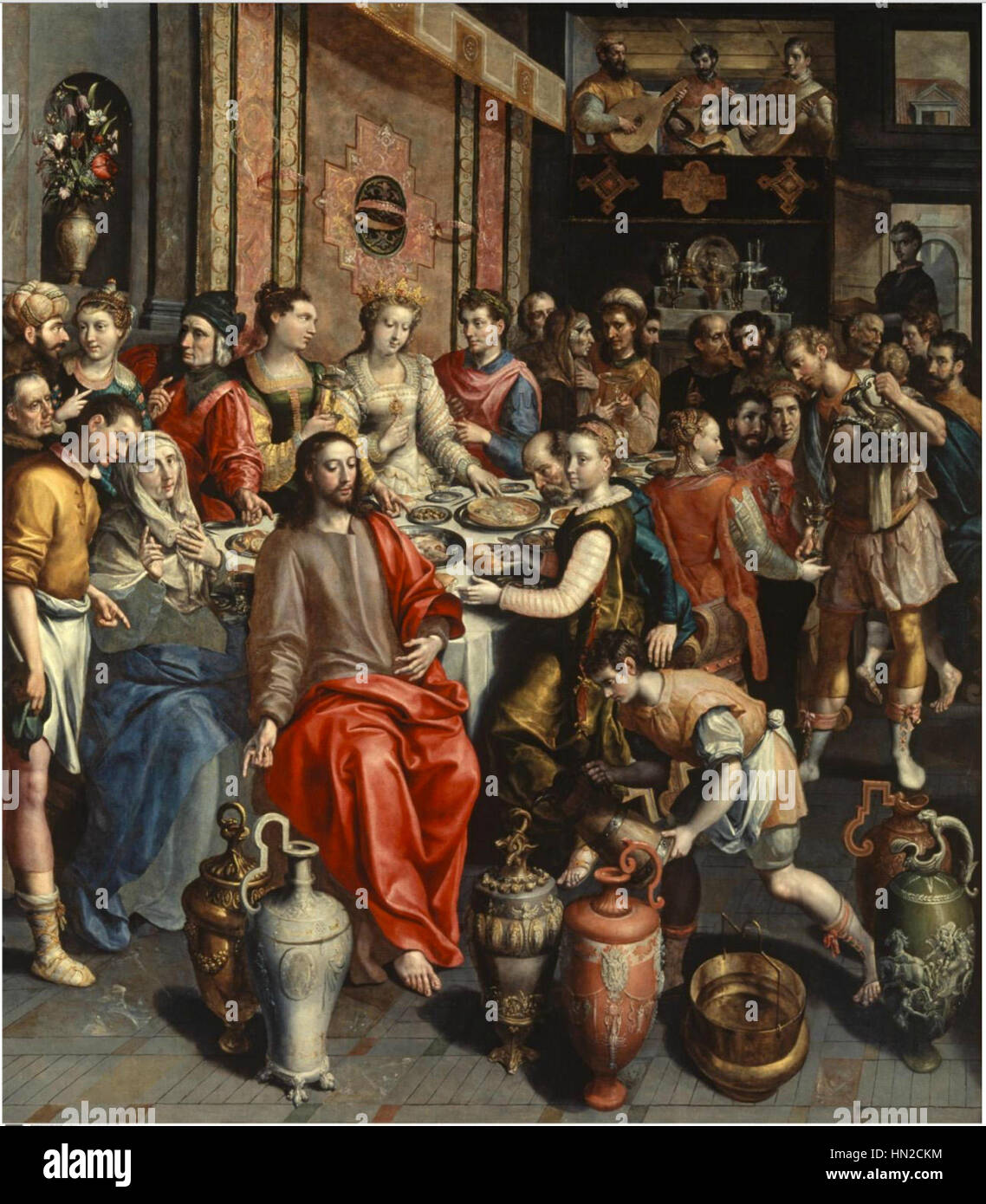La peinture de Marten de vos intitulée 'Cana' fait probablement référence à une représentation du mariage biblique à Cana, où Christ a accompli son premier miracle. L'œuvre reflète l'habileté de de vos en peinture religieuse, incorporant des détails riches et une expression émotionnelle, caractéristiques des flamands du XVIe siècle La scène se concentre sur l'intervention divine du Christ et sa signification dans la tradition chrétienne. Banque D'Images
