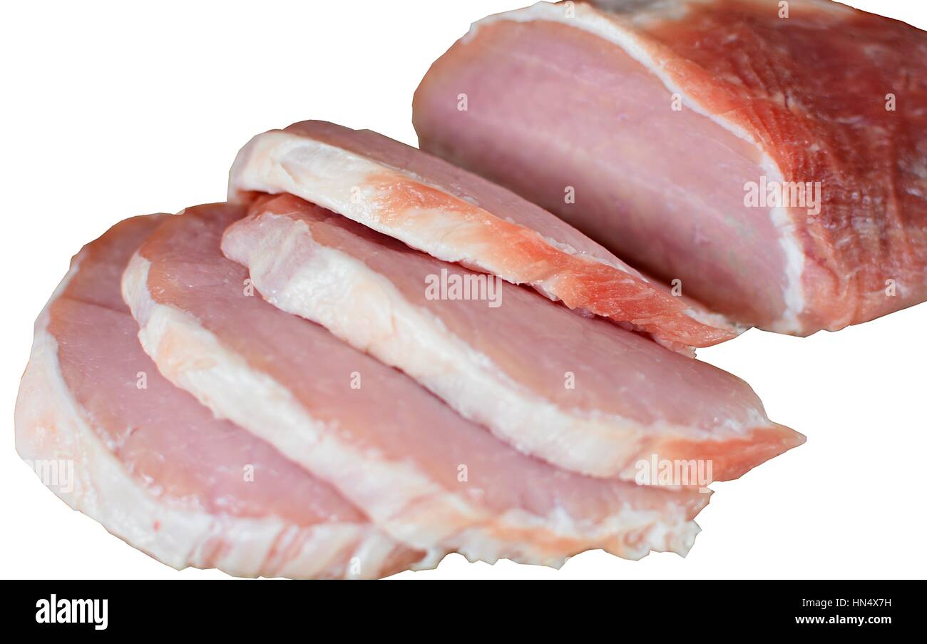 Tranches de viande de porc cru isolé sur fond blanc. Banque D'Images