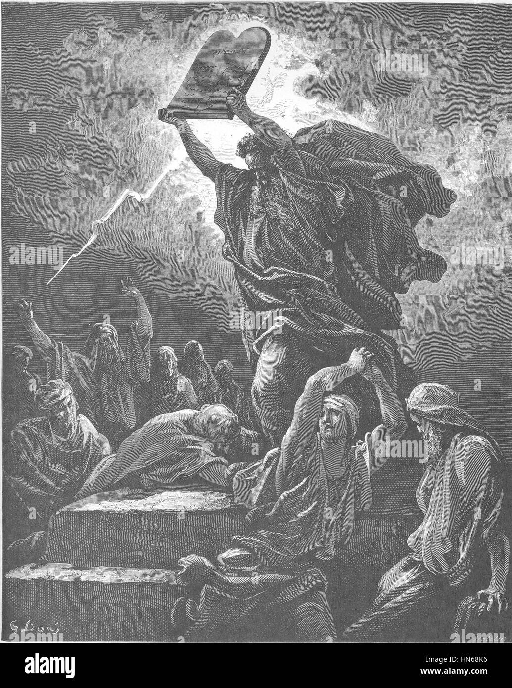 Cette œuvre représente le moment biblique dramatique où Moïse brise les tablettes de la Loi. La scène souligne les émotions intenses et la colère divine impliquées dans ce moment charnière dans l'histoire de l'Exode. Banque D'Images