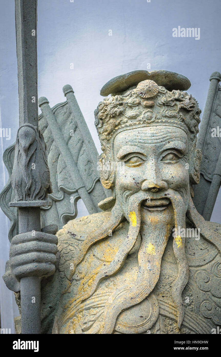 Statue de pierre chinois dans le Wat Pho, Bangkok, Thaïlande Banque D'Images