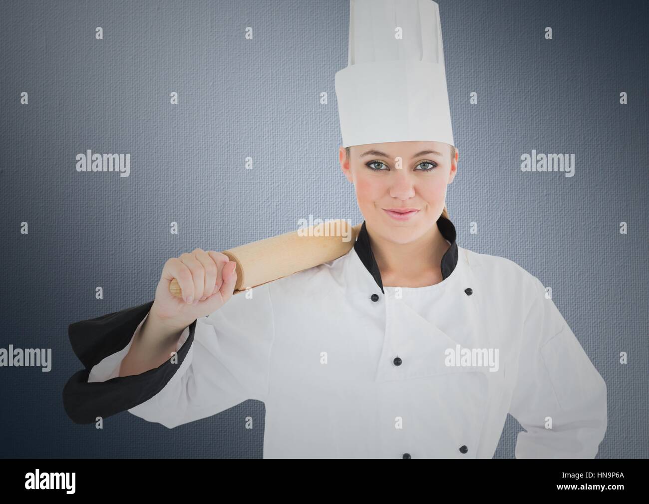Digital composite de chef avec rouleau à pâtisserie contre l'arrière-plan de la marine Banque D'Images