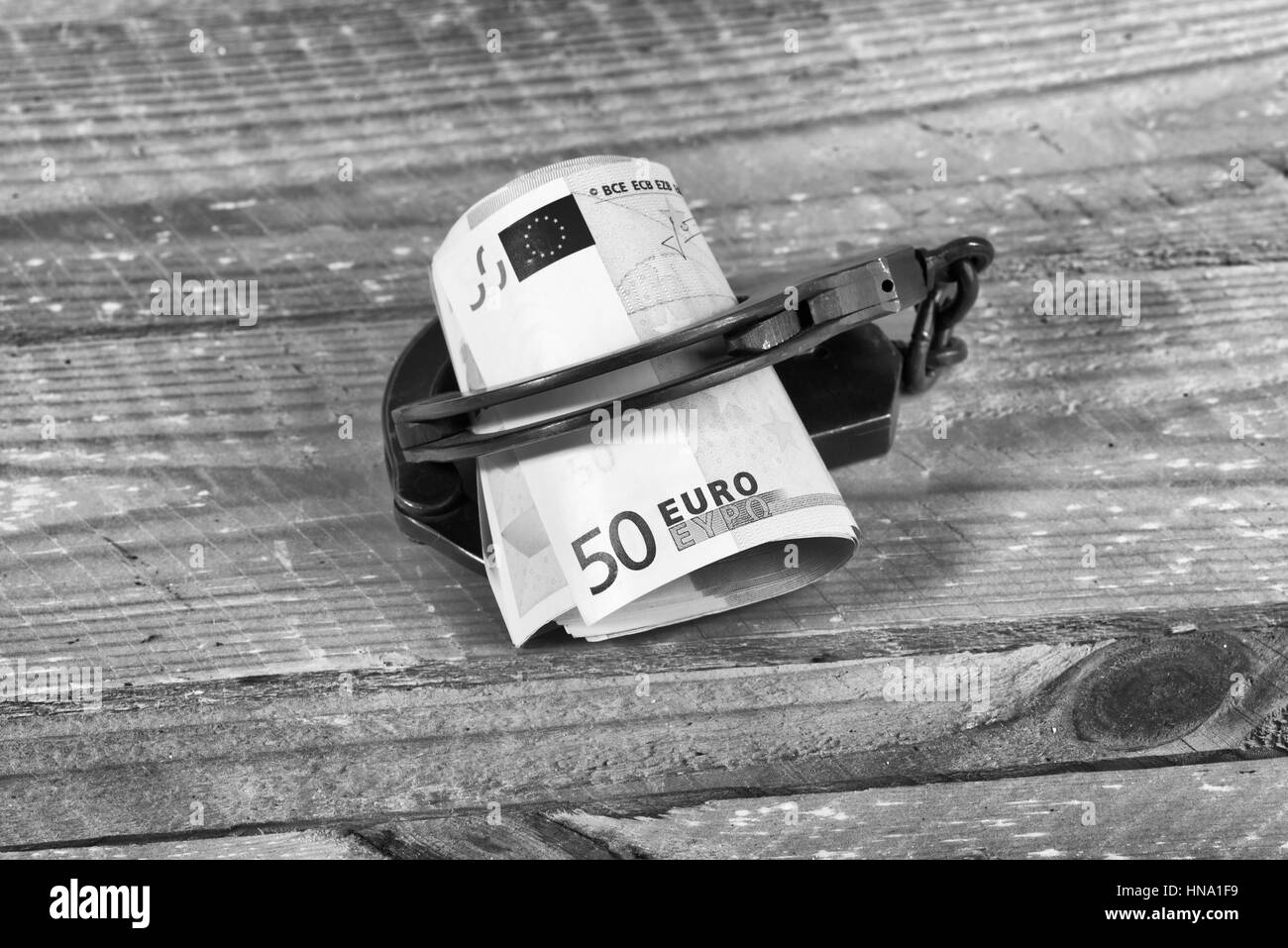 L'introduction des billets et des menottes Banque D'Images