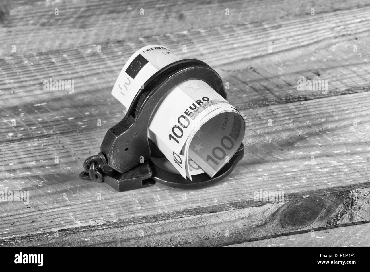 L'introduction des billets et des menottes Banque D'Images