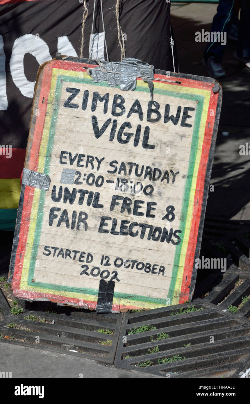 Zimbabwe vigil protester placard Banque D'Images