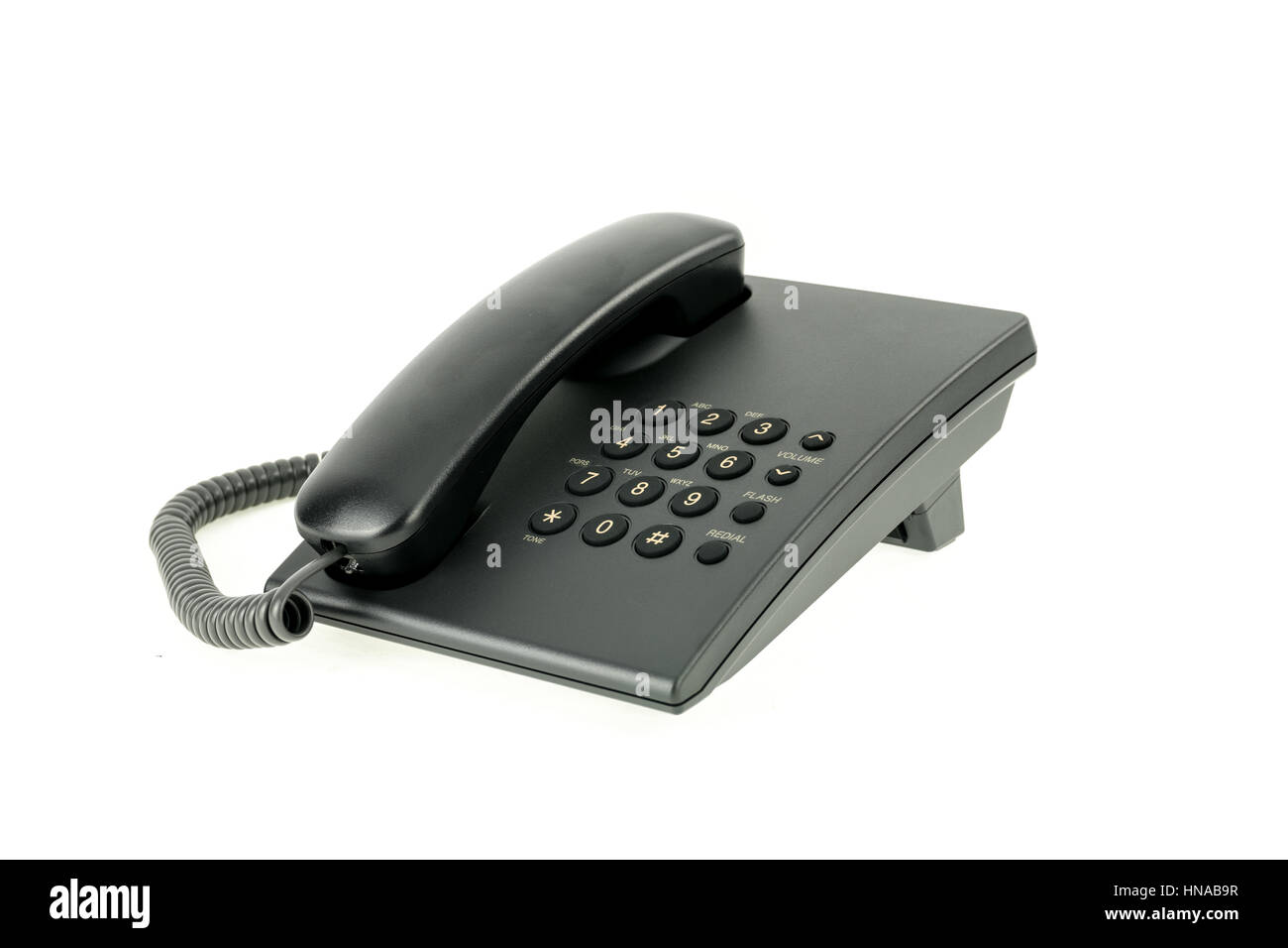 Téléphone de bureau noir avec combiné raccroché isolé sur fond blanc Banque D'Images