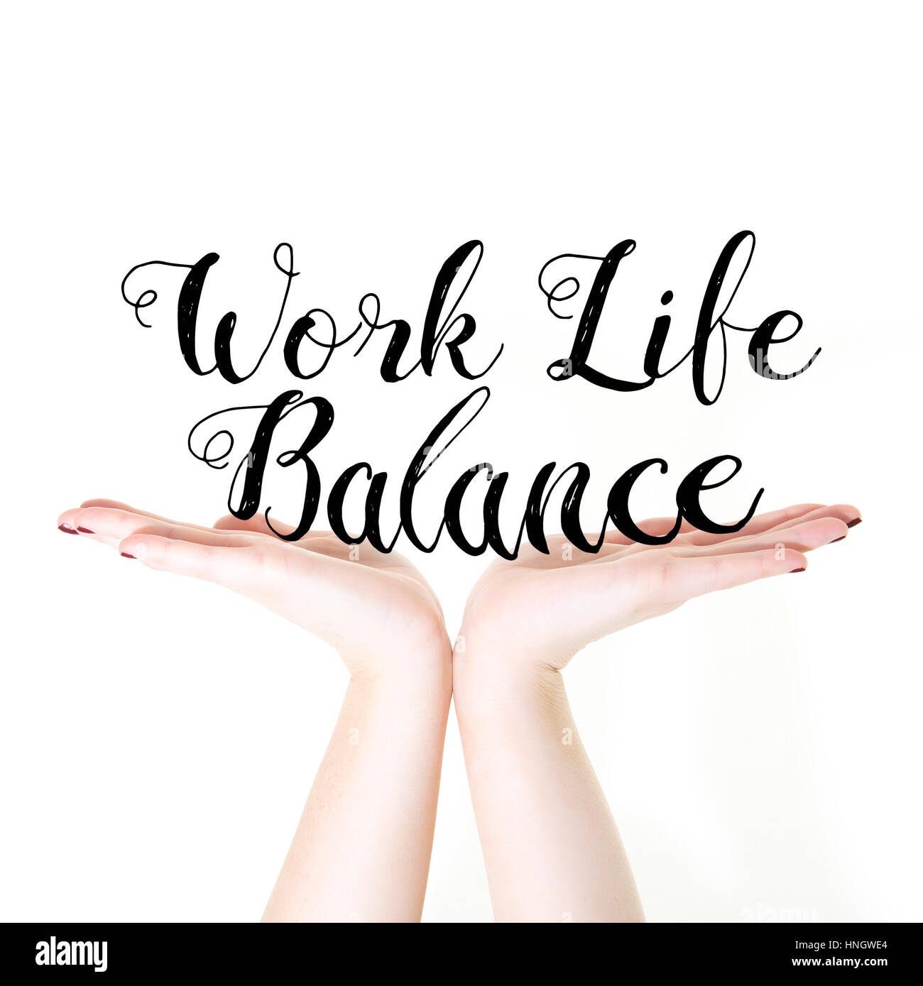 Mains tenant les mots Work Life Balance sur un fond blanc Banque D'Images