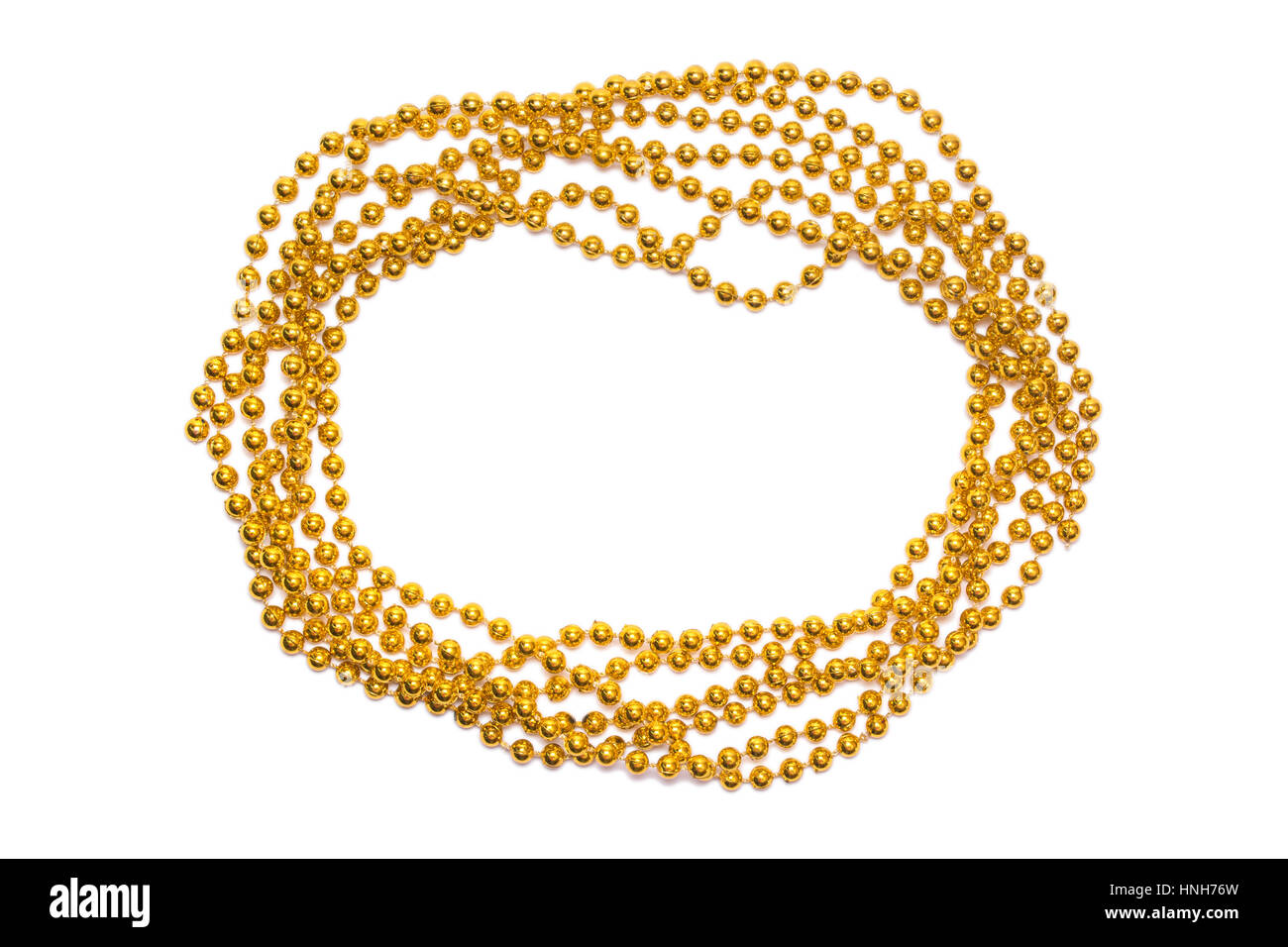 Perles dorées isolées à la frontière. Cadre de Noël. Golden Shine. Fond jaune Banque D'Images