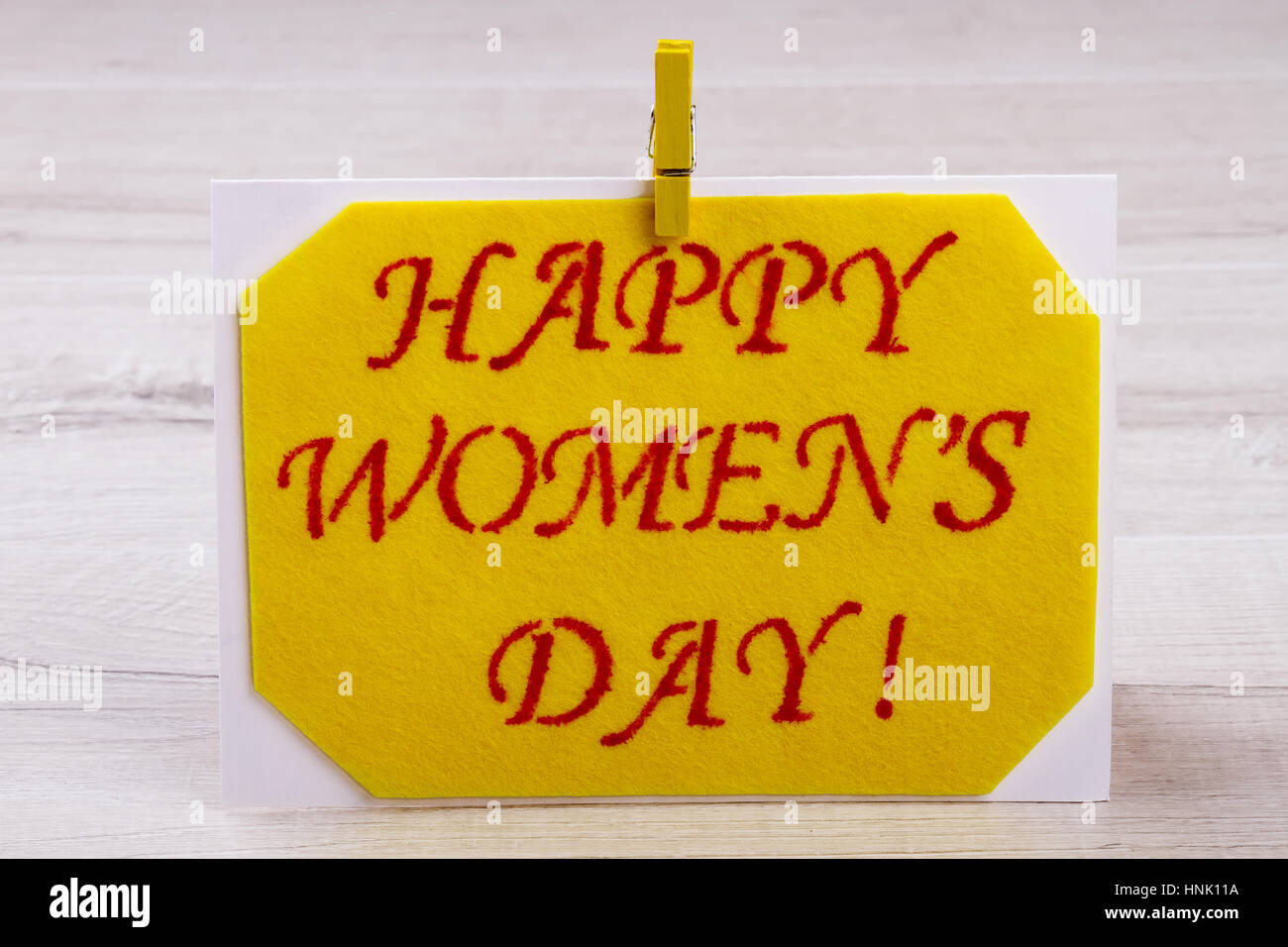 La Journée de la femme carte avec clothespin. Banque D'Images
