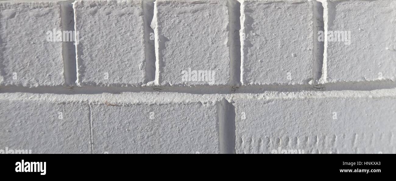 Fond brique blanc texturé en couches verticales et horizontales Banque D'Images