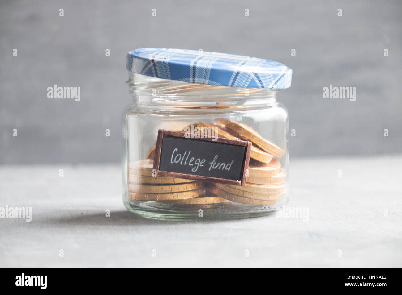 College fund label et de pièces d'or Banque D'Images