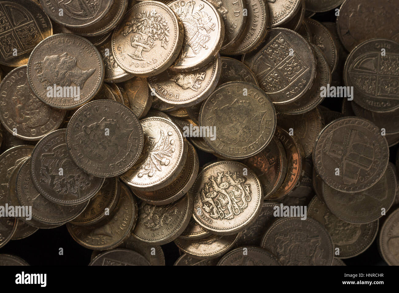 Des piles de pièces livre disposés en tas. Banque D'Images